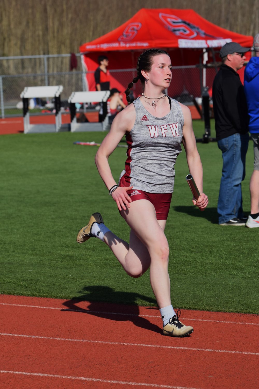Amanda Bennett runs the anchor leg of W.F. West's 4x100 relay at the Cardinal relays in Orting on March 18.